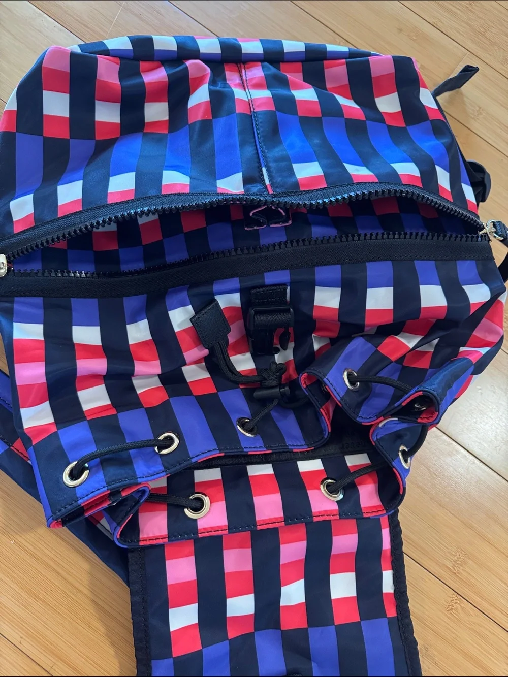 Kate Spade navy, royal blue, pink & red striped backpack